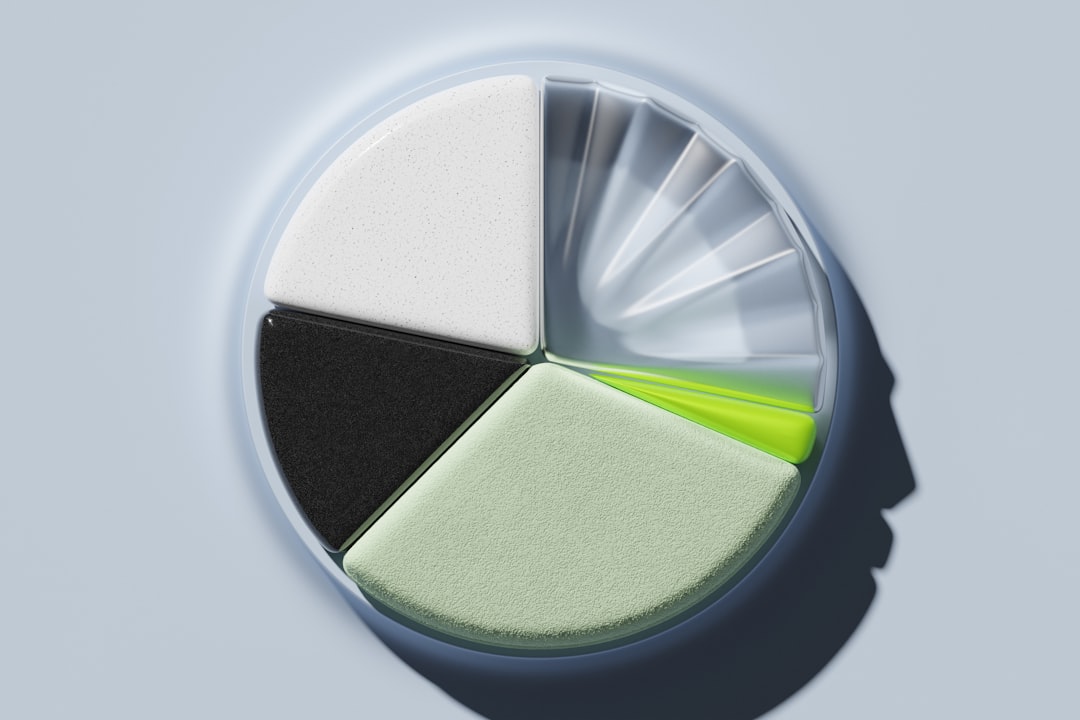 Abstract pie chart composed of various textured segments in light colors on a smooth background