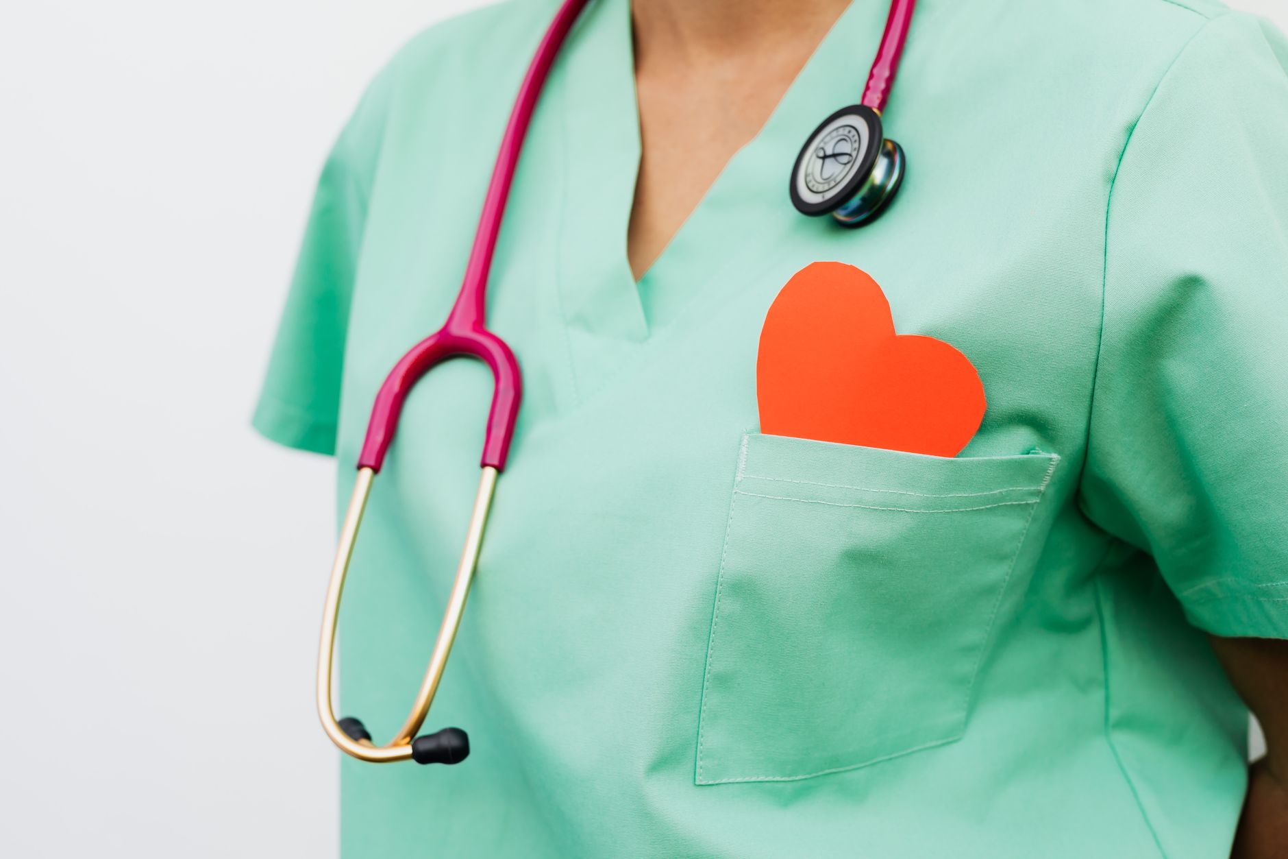 A healthcare professional with a stethoscope and red heart symbol emphasizes cardiology care. — Innovative Approaches: Dr. Ju